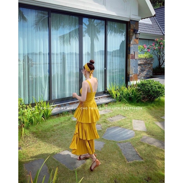 G9  - đầm xoè vàng dập tầng nơ vai