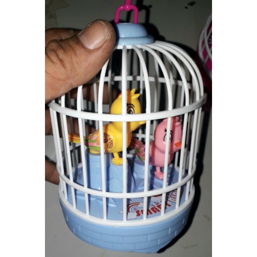 Một chiếc lồng chim mini bằng nhựa có nhạc và đèn rất đẹp Tặng kèm pin