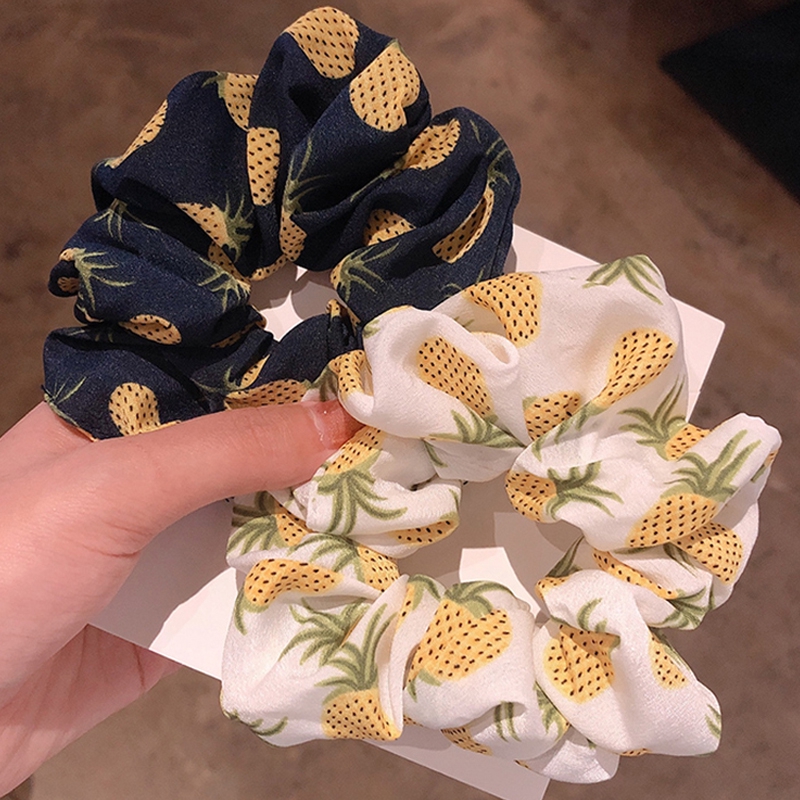 Thun cột tóc hình trái dừa phong cách thời trang dễ thương cho phái nữ