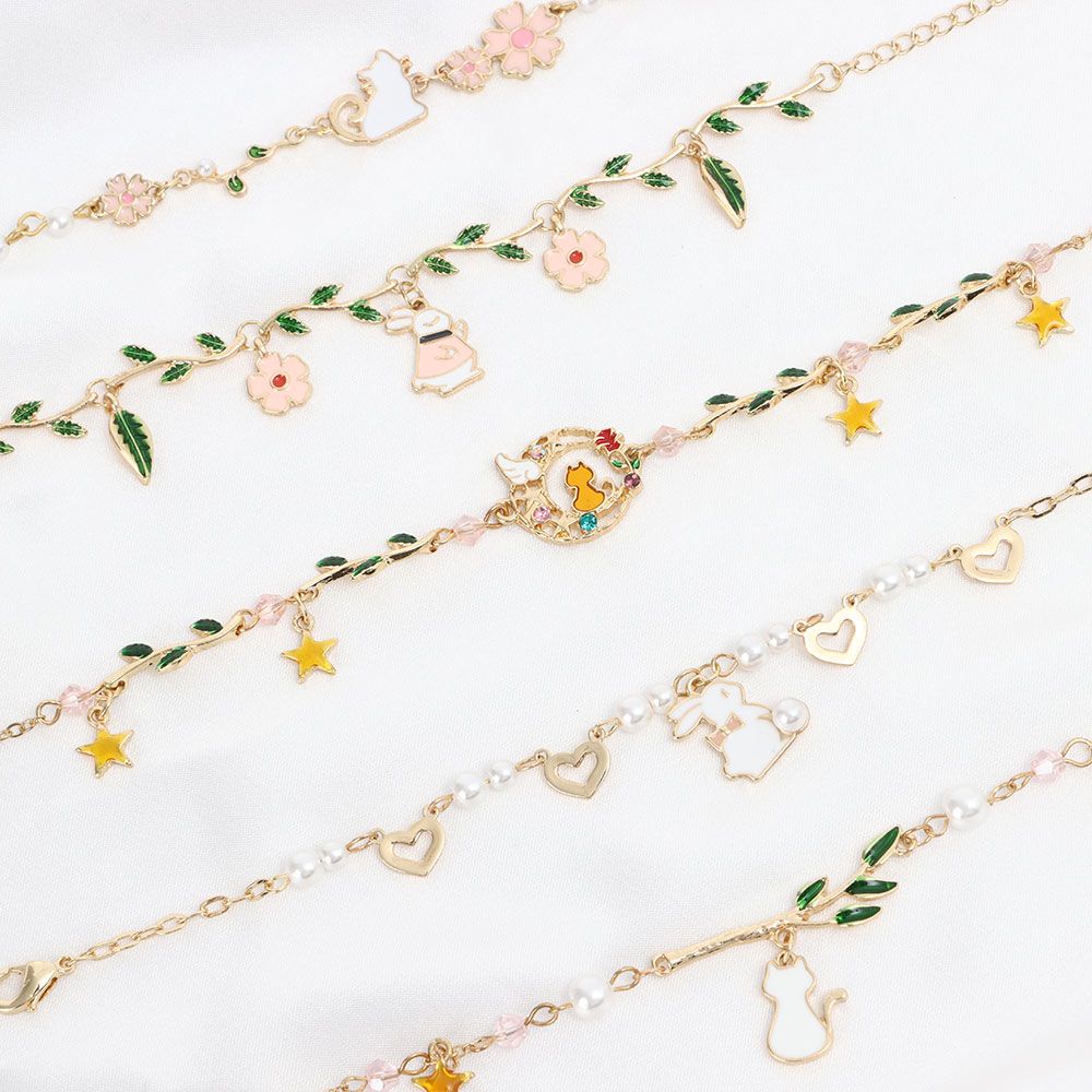 Vòng tay đính ngọc trai nhân tạo hình hoạt hình dễ thương