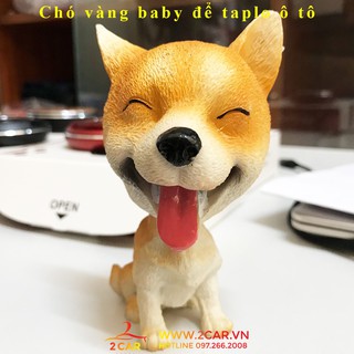 Chó lắc lư đầu trang trí taplo xe ô tô