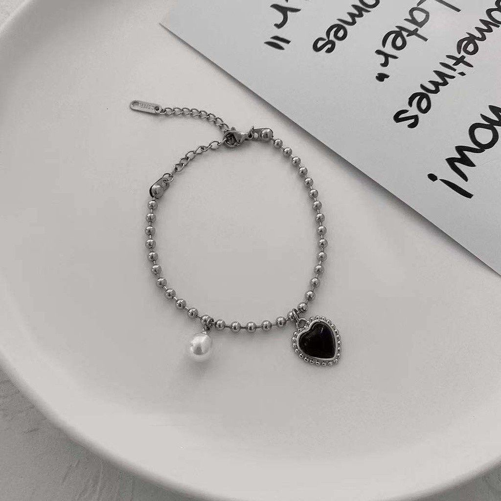 Vòng tay bằng thép titan màu đen đính ngọc trai nhân tạo phong cách cổ điển thời trang cho nữ