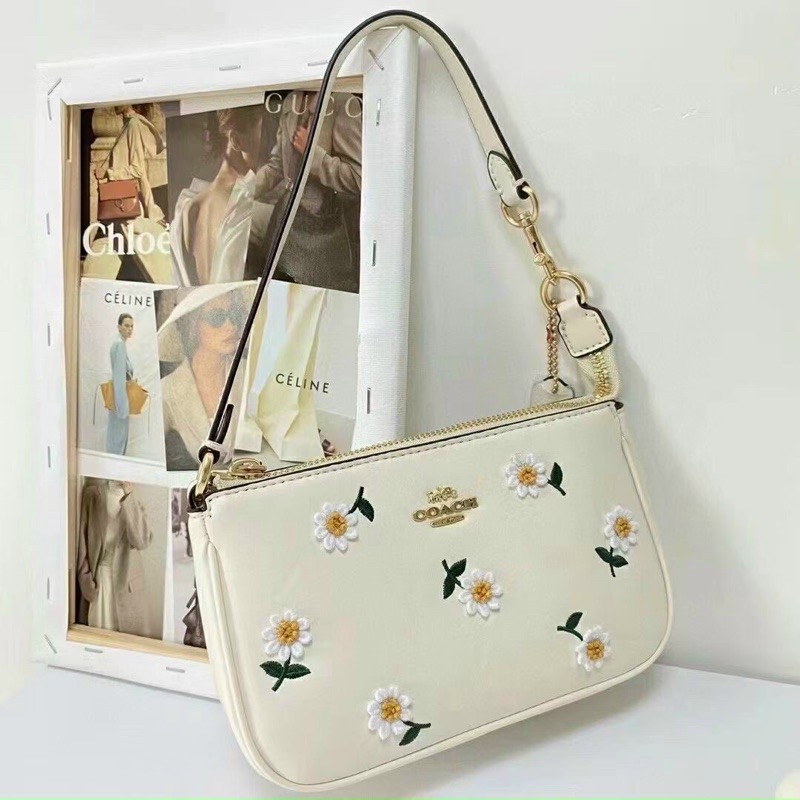 TÚI COACH NOLITA HOA CÚC