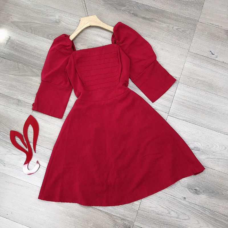 Đầm nút bọc tay phồng xép ly ngực mocking