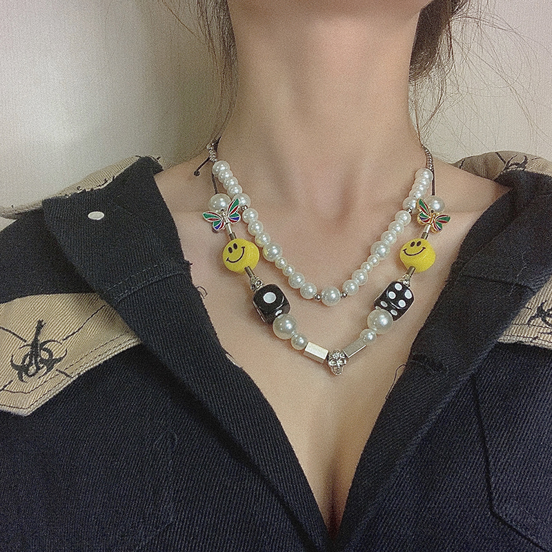 Dây chuyền xâu ngọc trai nhân tạo mặt cười mặt xúc xắc đầu lâu hợp thời trang