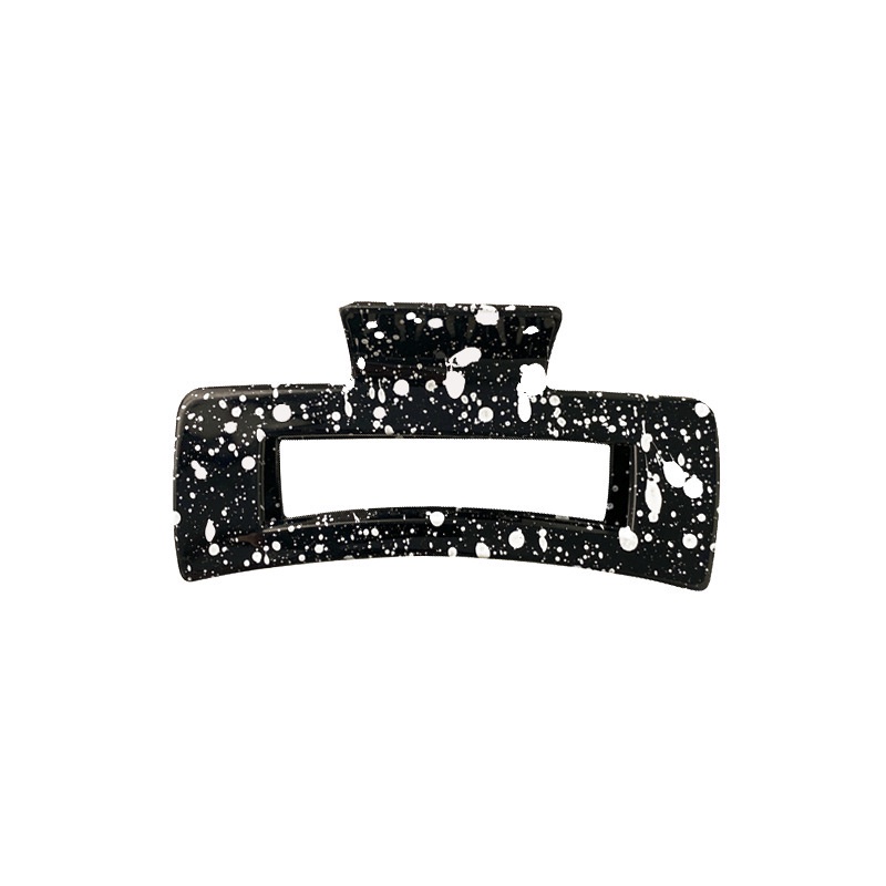 Kẹp tóc họa tiết bò sữa đen trắng