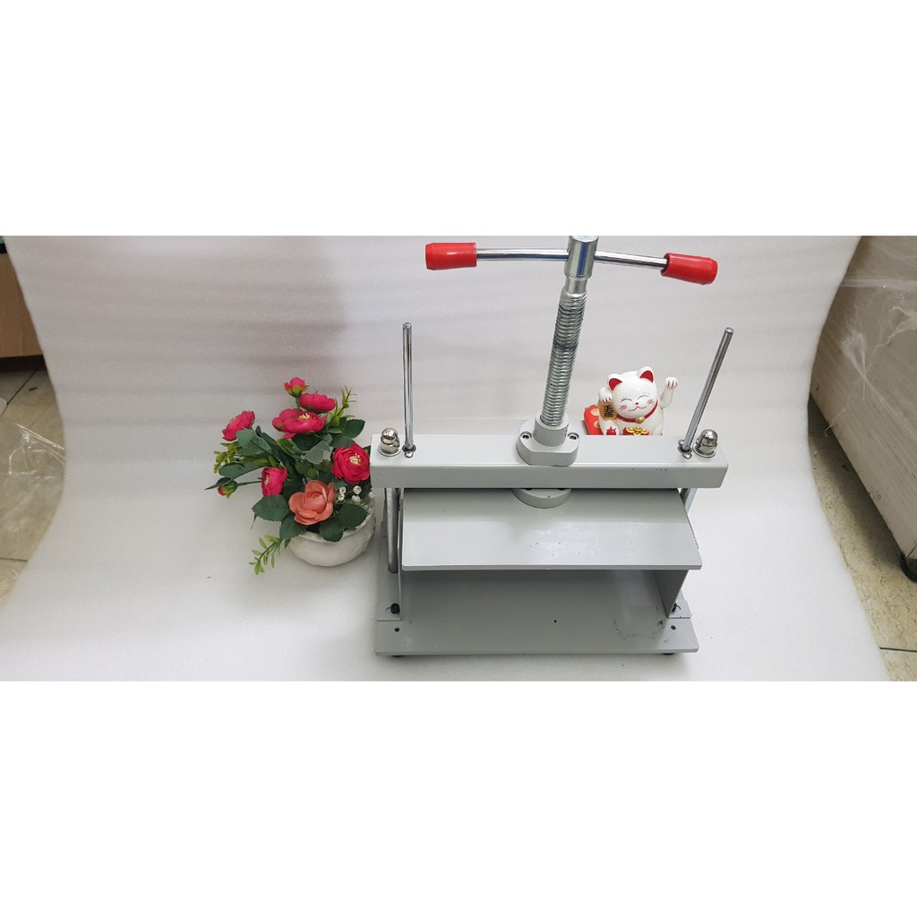 Dụng cụ đè sách khổ A4 cong vênh sau khi Photocopy xong