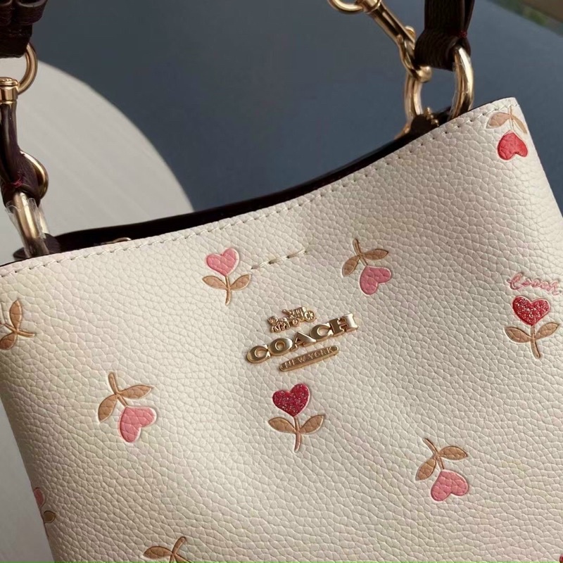 Túi Coach bucket hoa xinh size nhỏ