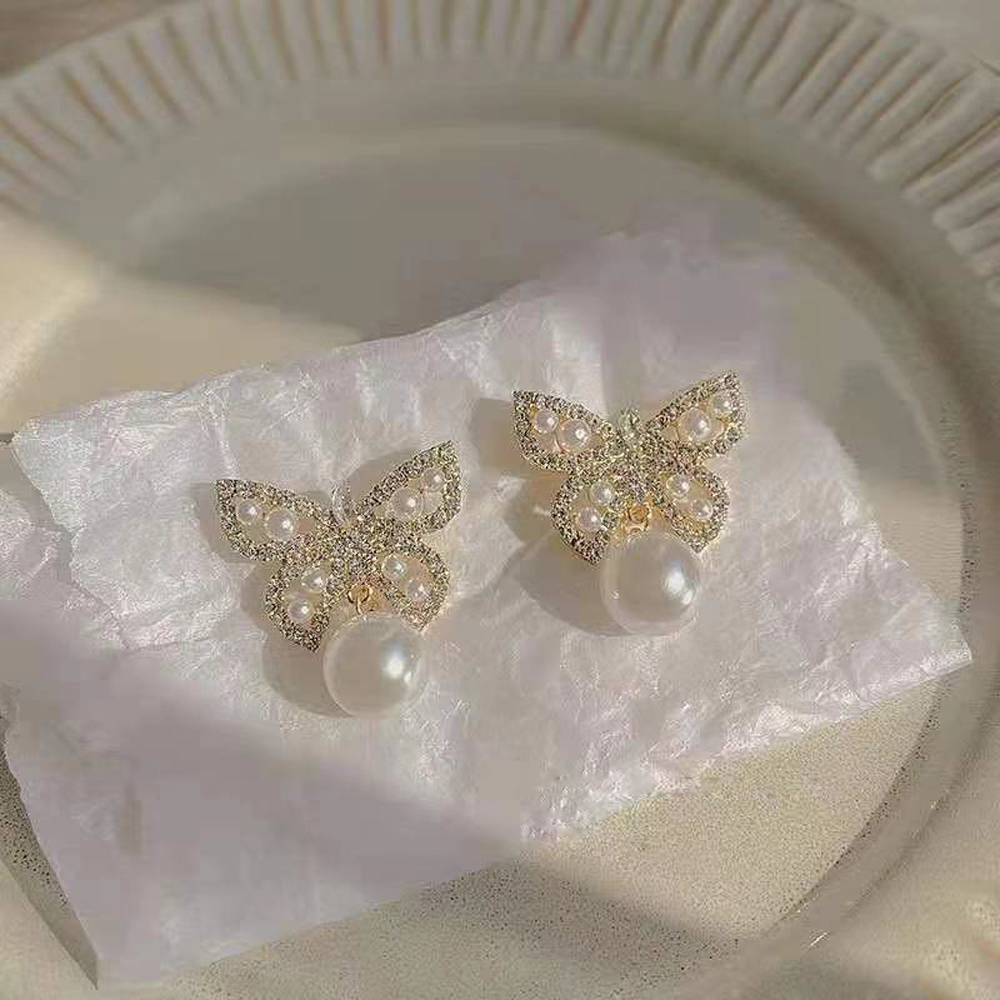 Khuyên Tai Nữ Trang Tạo Hình Độc Đáo