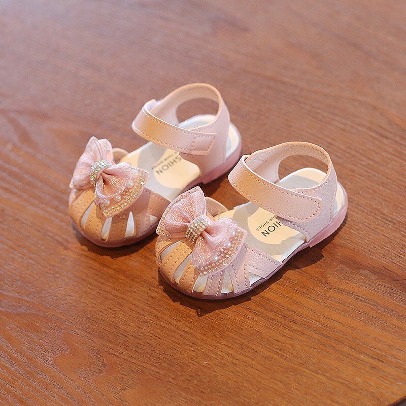 Sandal tập đi cho bé gái - dép quai hậu rọ cho bé từ 6th-4 tuổi có nơ đính đá chống trơn chống vấp siêu cute (A9)