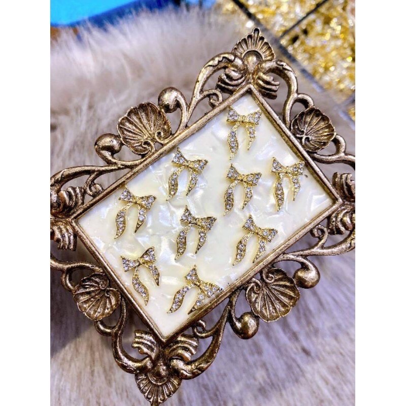 phụ kiện trang trí móng charm nơ quốc dân