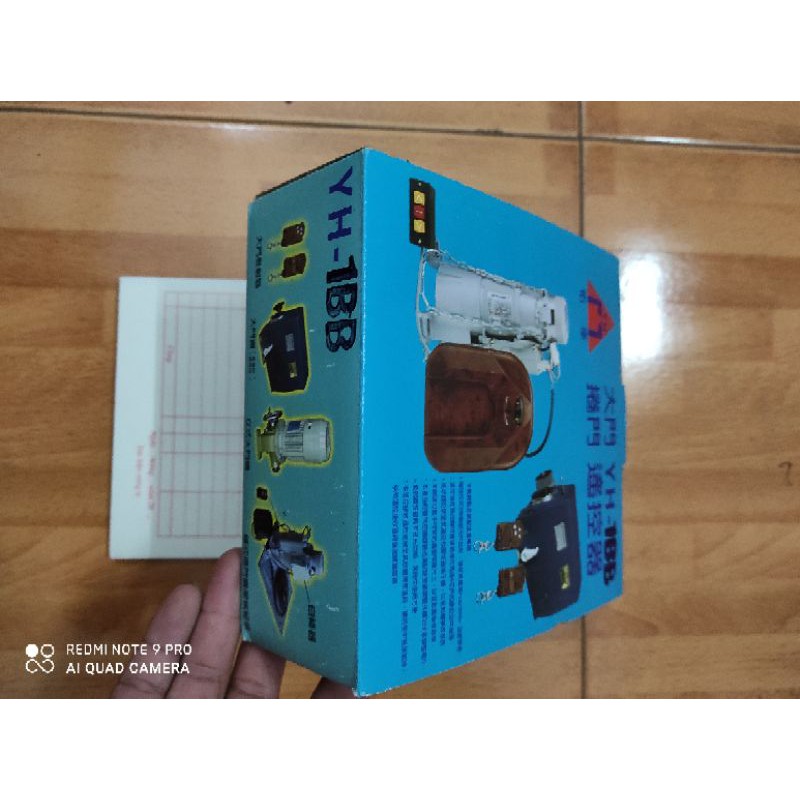 Tay điều khiển cửa cuốn YH 1B2-1BB mã nhảy 315 mhz Đài loan Xịn và Copy