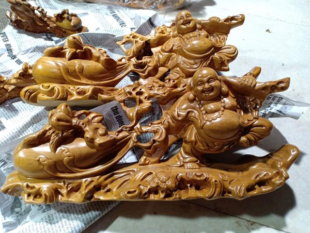 Tượng phật di lặc kéo bao gỗ thơm [ngang 40cm]