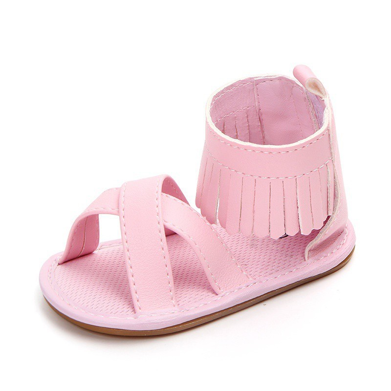 Giày sandal da PU màu trơn quai đan chéo phối tua rua đáng yêu cho bé gái