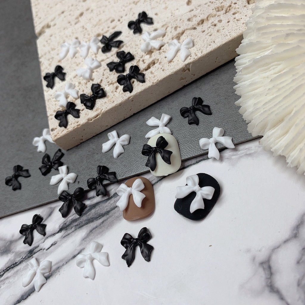 Charm nơ dài đen trắng trang trí móng nail