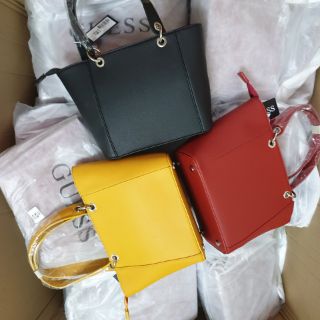 Túi cầm tay guess