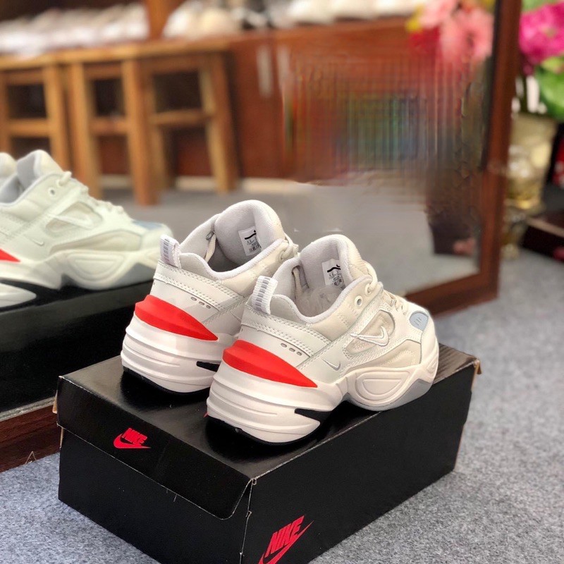 Giày Sneaker trắng kem gót phối cam