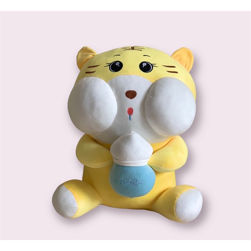 Gấu bông hổ ôm bình sữa