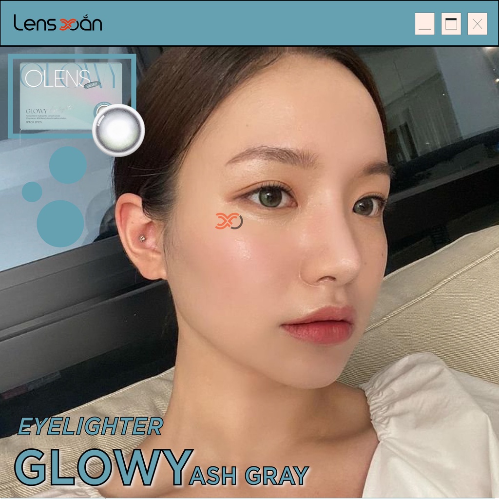 KÍNH ÁP TRÒNG EYELIGHTER GLOWY ASH GRAY của OLENS: LENS XÁM PHỦ BÓNG MIX 3 DẢI MÀU SÁNG NHẸ| LENS XOẮN