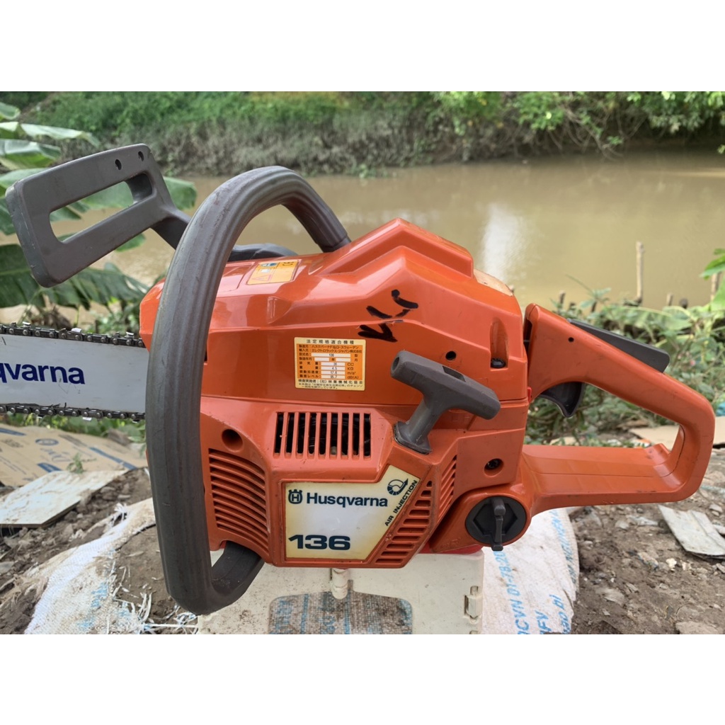 MÁY CƯA XÍCH HUSQVARNA 136 THUỴ ĐIỂN NHẬT BÃI