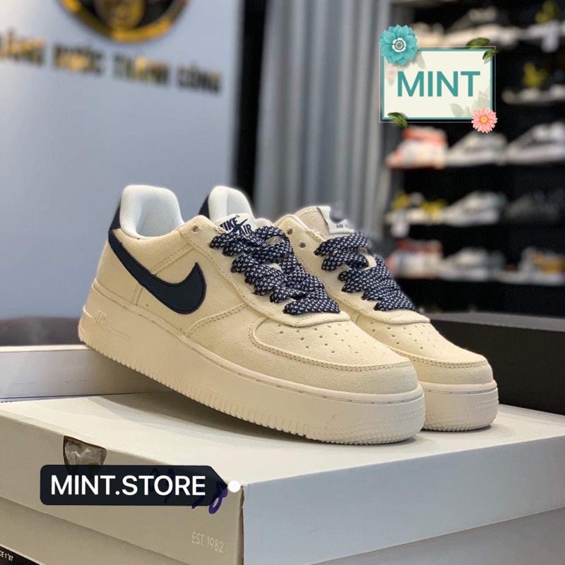 Giày thể thao sneaker kem dây xanh coban