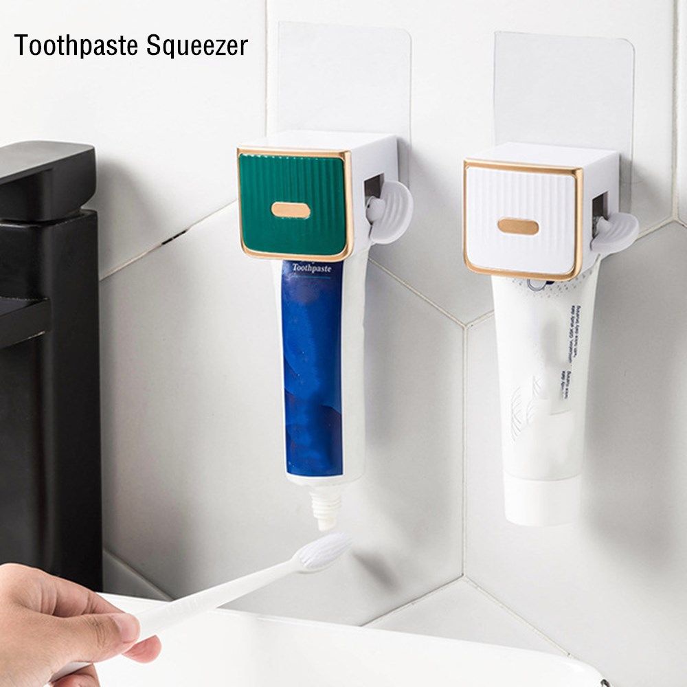 Dụng cụ hỗ trợ bóp tuýp kem đánh răng bằng nhựa dán tường tiện lợi