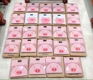 Cân điện tử chú lợn hồng