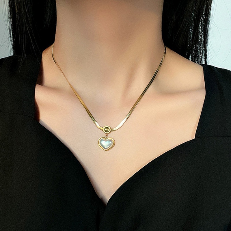 dây chuyền titan nữ 18k vàng chống gỉ Ngọc trai tim vòng cổ Phụ kiện thời trang