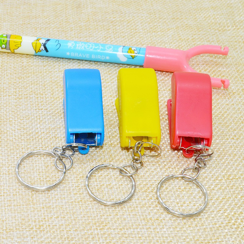 Móc khóa chiếc bấm kim tiện lợi