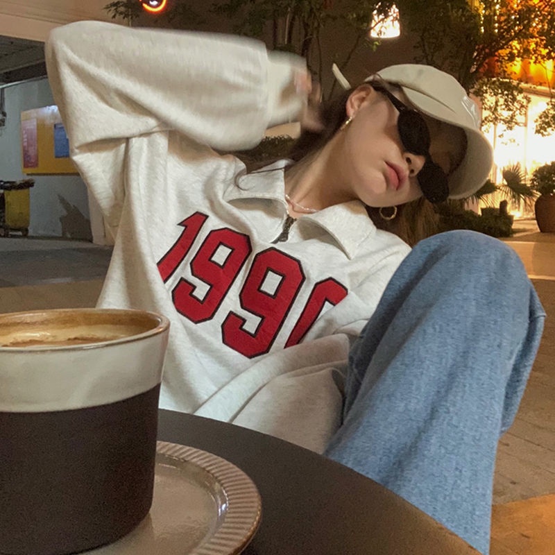 Áo sweater cổ polo tay dài dáng rộng thêu họa tiết phong cách Hàn Quốc thời trang mùa thu 2021 cho nữ