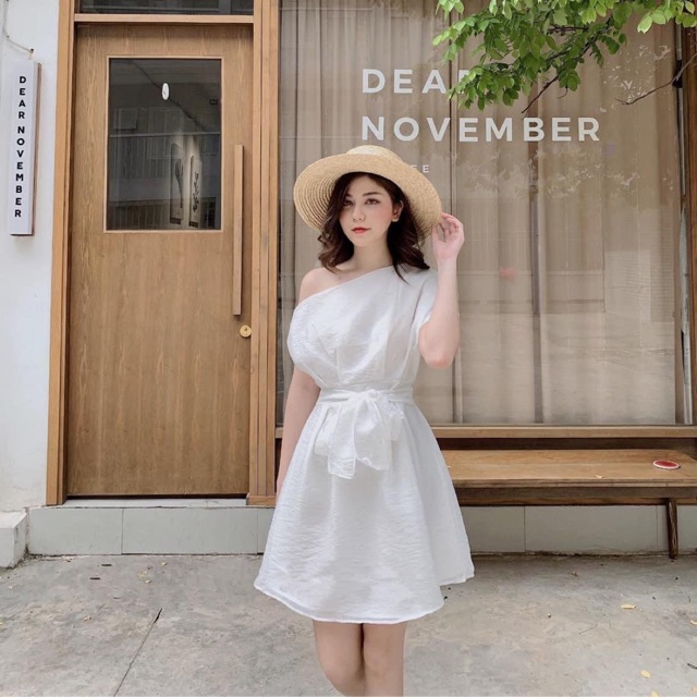 Váy lệch vai đau nơ