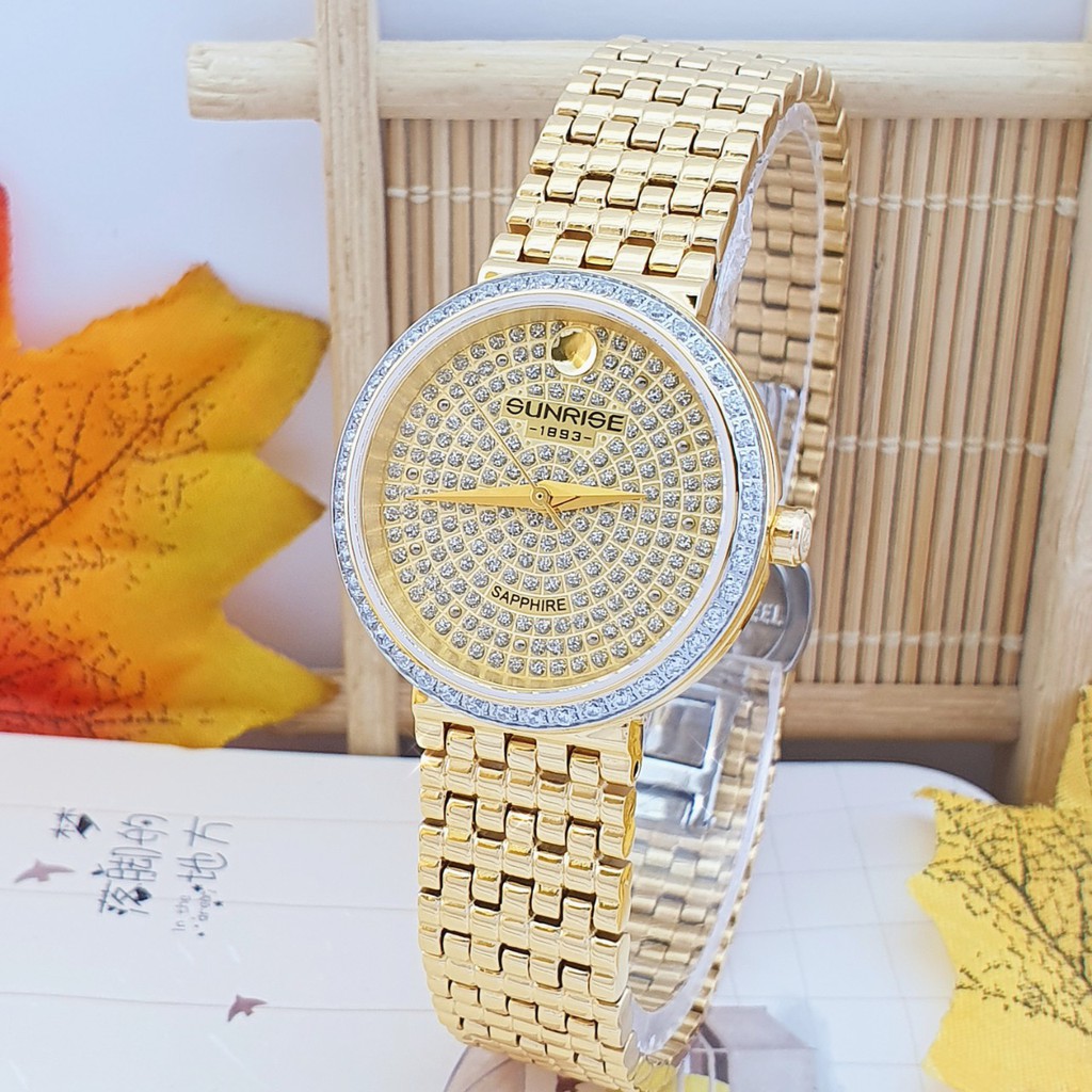 Đồng hồ Nữ SUNRISE 9807AA. Full kim. Viền và mặt full Diamond siêu sáng. Kính Sapphire chống trầy xước tốt.