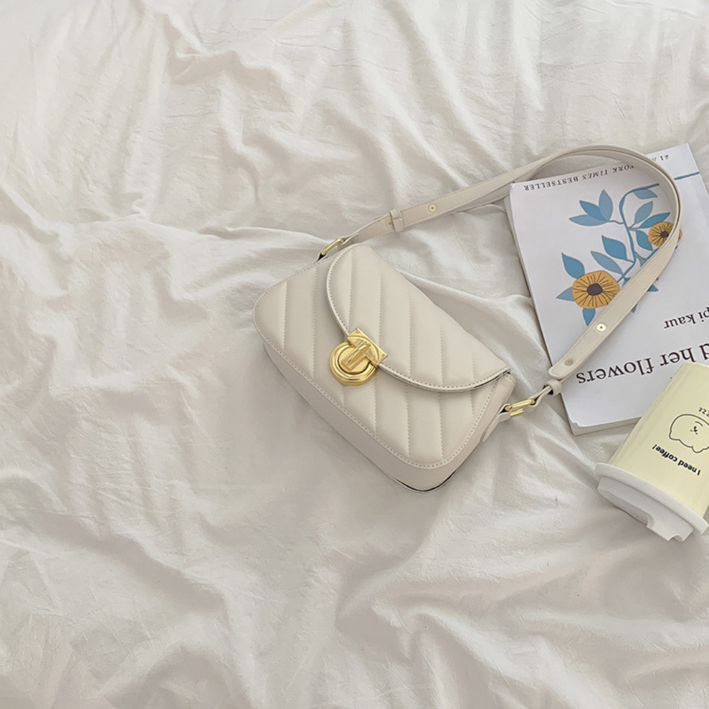 Túi đeo vai đeo chéo da mềm trần trám khóa tròn cá tính La.orie - La011