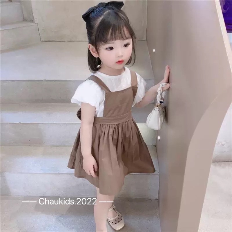 Váy yếm nơ lưng bé gái