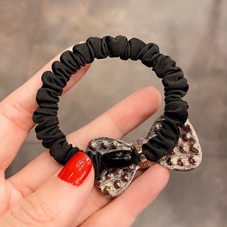 cột tóc mặt đính đá