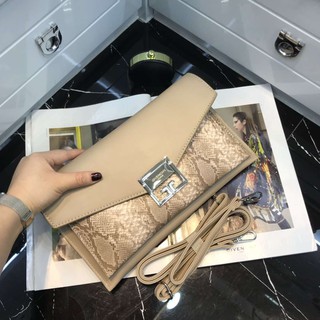 túi xách cầm ta da rắn dự tiệc