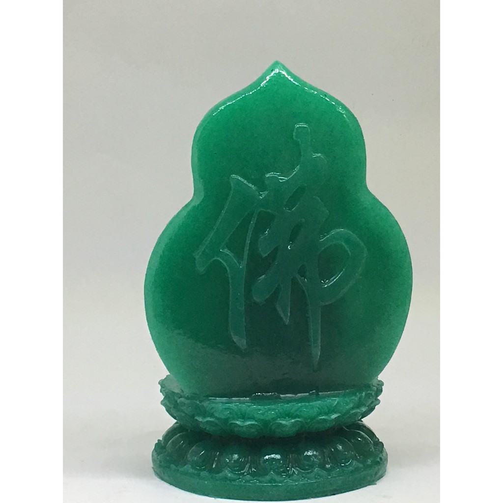 Tượng Phật Bà Quan Âm Đá poly màu xanh ngọc cao 15 rộng 8 cm.Gía 109000