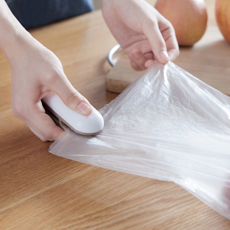 Máy niêm phong mini Túi nhựa đựng đồ ăn nhẹ ép mở hàn miệng xách tay bảo quản thực phẩm gia đình nhỏ
