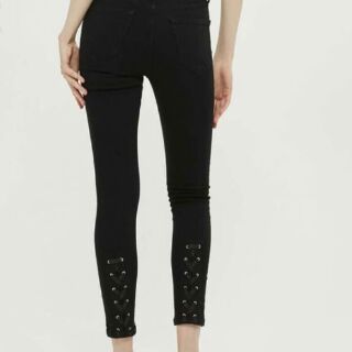 Quần jeans đan dây chân