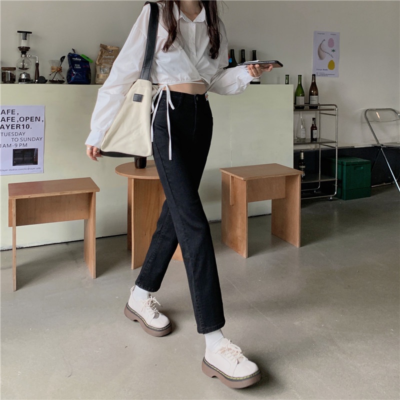 Porozi  Quần jean nữ cạp cao dáng ôm xẻ tà phong cách Hàn Quốc