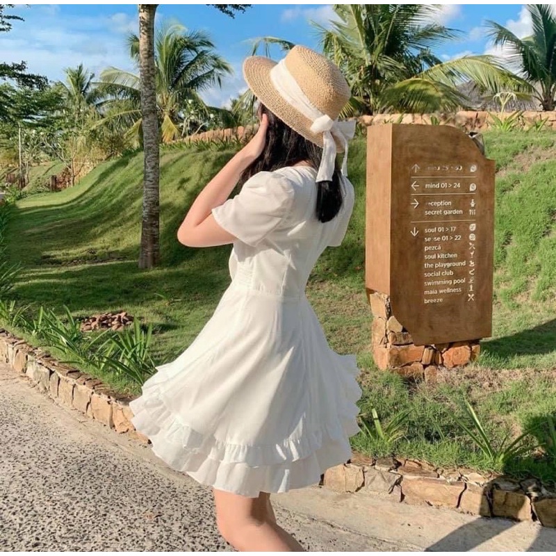 Đầm trắng cutout cột nơ chân bèo