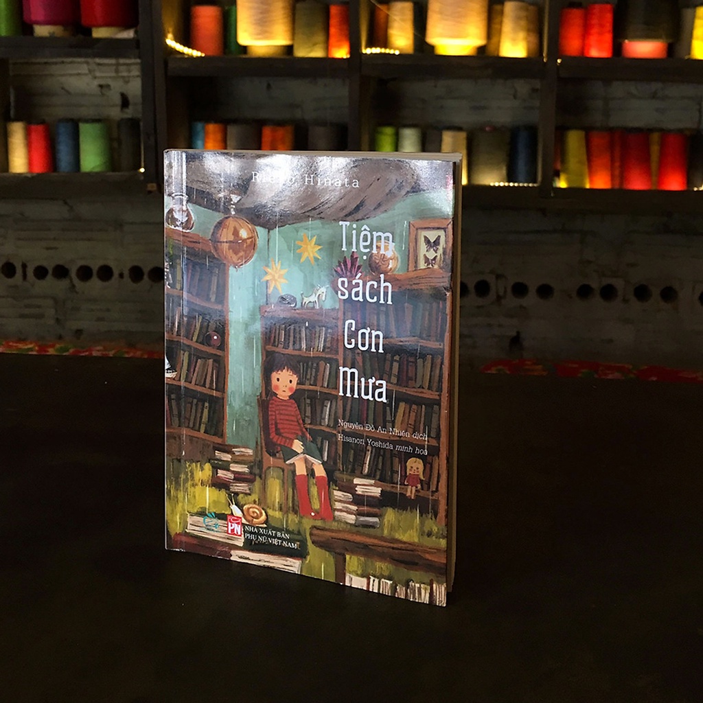 sách - Tiệm sách cơn mưa tập 1