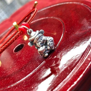 Vòng đỏ mix charm thần tài