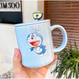 Cốc sứ doremon đáng yêu kèm nắp và thìa.