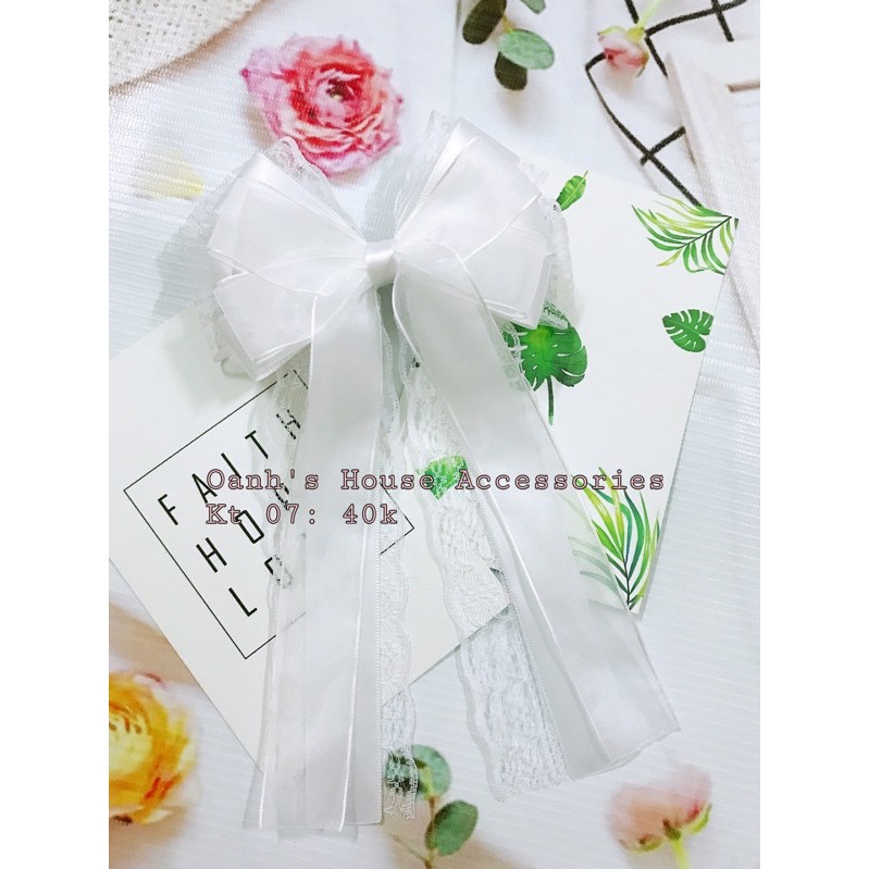 Kẹp nơ ren 3 tầng phối satin và voan