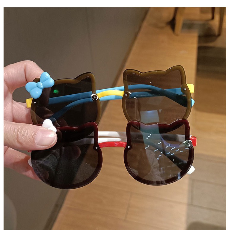 Kính hình mèo có nơ cho bé nơ trắng gọng đỏ, kính râm cho bé, kính đi nắng cho bé trai và bé gái mã 2927 | BigBuy360 - bigbuy360.vn