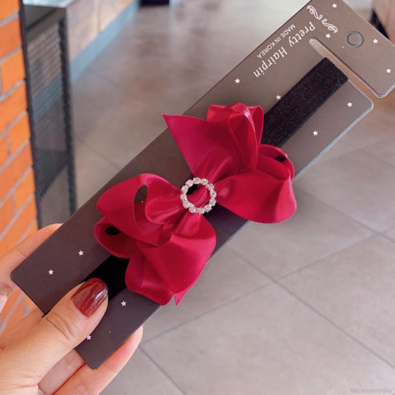 Băng đô cài tóc chúc mừng năm mới cho bé gái