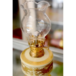 Đèn dầu sứ rồng vàng