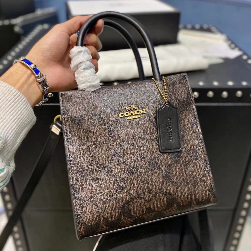 ❐♗✟Mua hàng Mỹ Túi xách COACH giấy Cally đeo vai nghe nhạc Tote Messenger bag