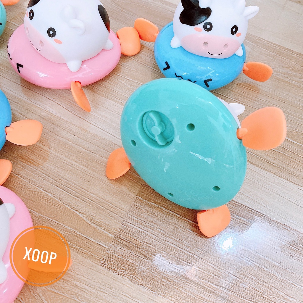 Đồ chơi nhà tắm bò sữa chèo thuyền phun nước vặn cót ngộ nghĩnh đáng yêu cho bé
